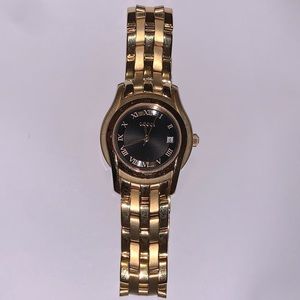 Gold Gucci Watch